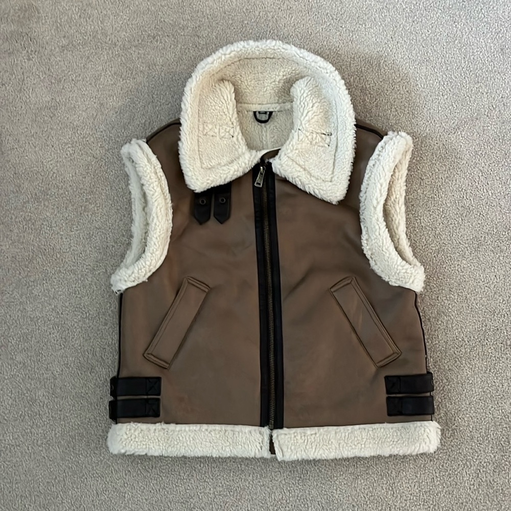 Faux leather and shearling vest